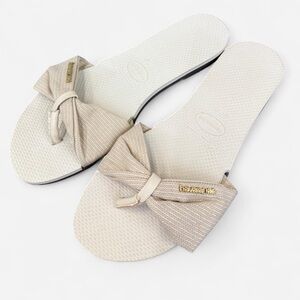 Cream Havaianas sandals with gold hardware  US 11 Summer